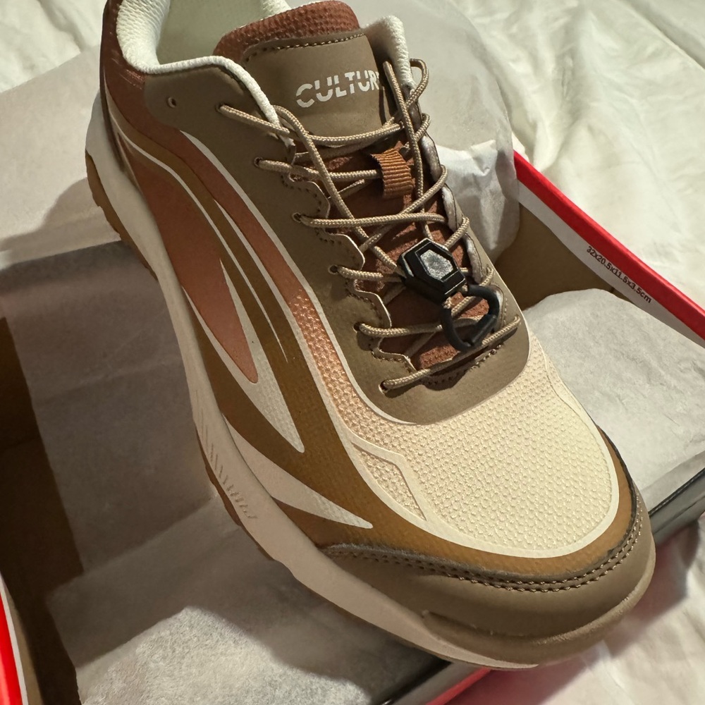 Brown and Cream Athletic Shoes with Sleek Design